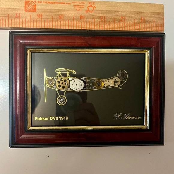 framed piece of art featuring a representation of an airplane with clock pieces - Picture 8 of 10